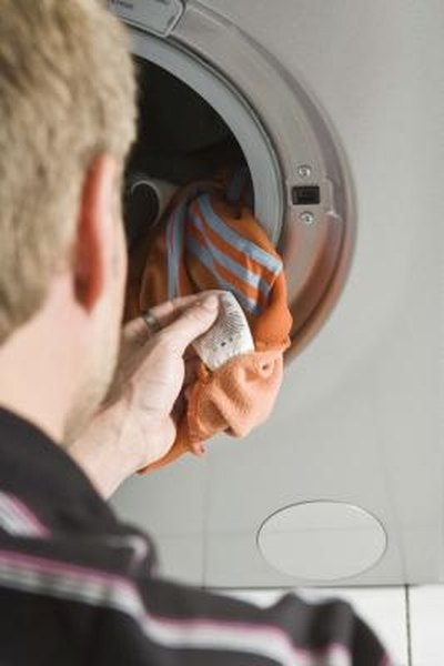 maytag neptune washer manual door release